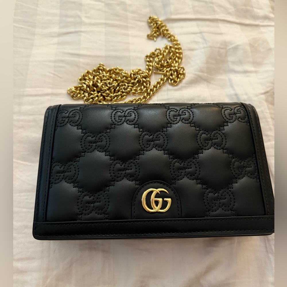 Sold ❌100% Authentic and Brand New - Gucci Black Quilted Clutch with Gold Chain